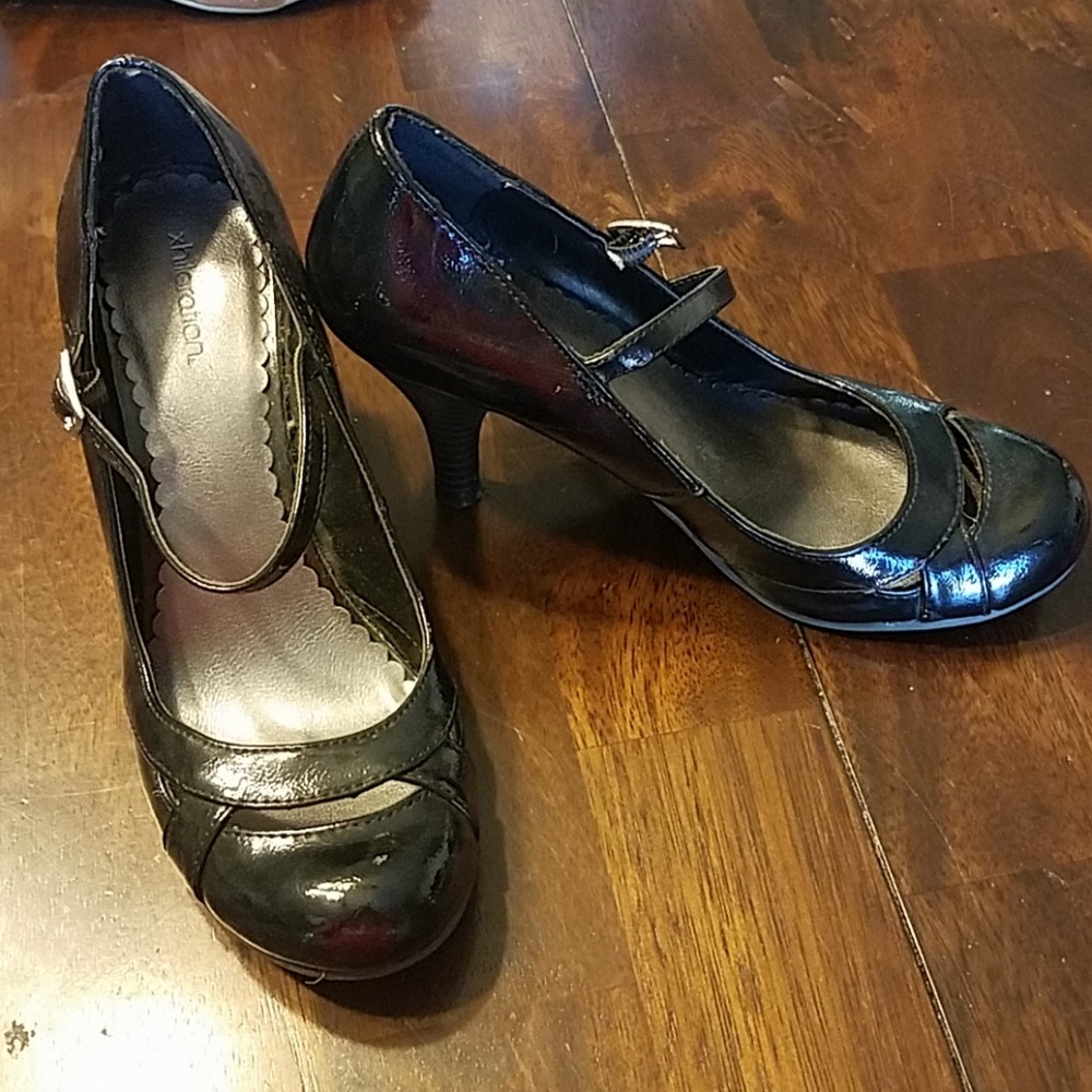 Black heels, size 6.5. Like new.